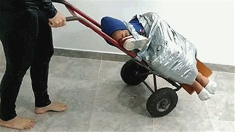 Laura Maria In B Tied Latina Transported Away On A Box Mover By A Greedy Catsuit Burglar