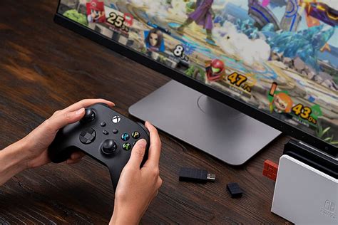 Giới thiệu 8BitDo USB Wireless Adapter 2 màu cam cho Nintendo Switch