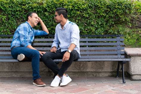 Latin Couple Gay Men Sitting On A Bench Gay Concept Stock Photo Image Of Handsome Nature