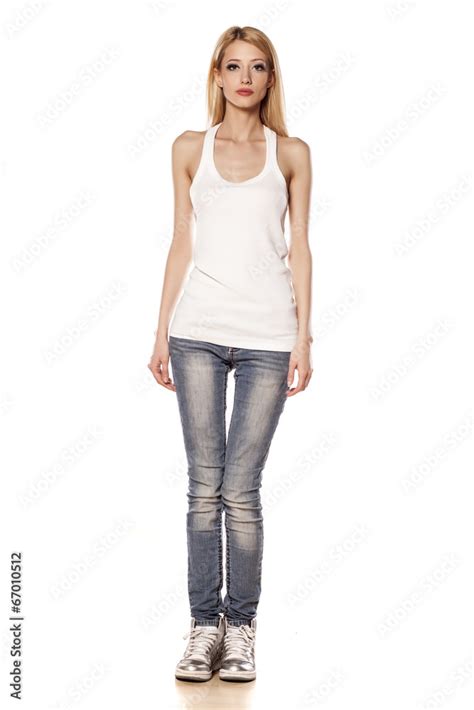 Skinny Blonde Girl Standing On White Background Stock Photo Adobe Stock