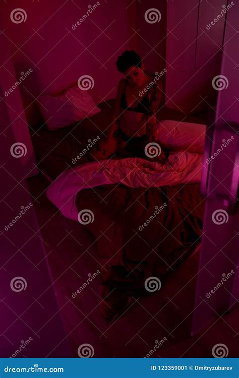 Raven Haired Girl In Black Lingerie Posing In Bed Stock Image Image