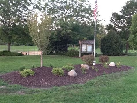 Flag Pole Landscaping With Large Rocks