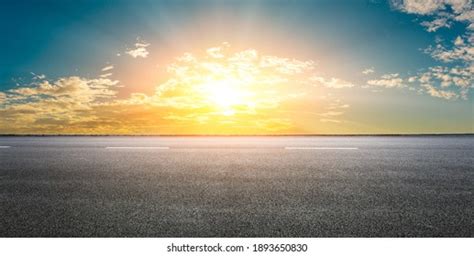 Asphalt Road Sky Clouds Sunsetroad Background Stock Photo