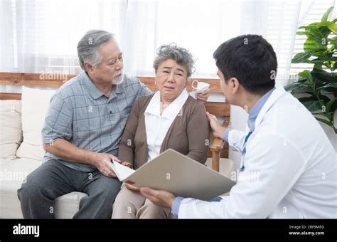 Young Caucasian Doctor Man Talking Result Of Examination On Tablet To