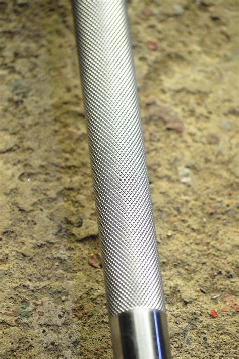 Everything to know about the olympic barbell spin and knurling 38