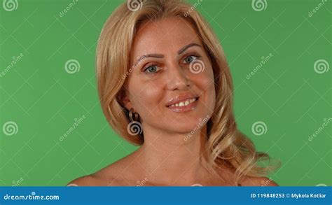 Gorgeous Mature Blond Haired Woman Smiling Seductively To The Camera Stock Video Video Of