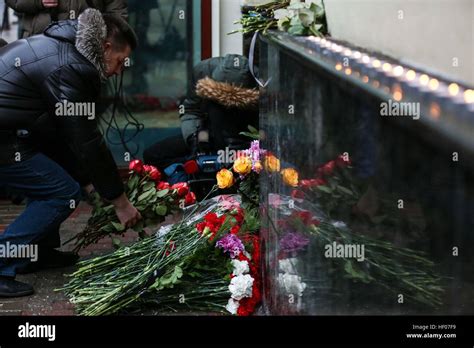 Moscow 25th Dec 2016 A Woman Lays Flowers Outside The Building Of