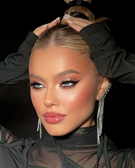 Beautiful Woman Blonde Hair Cat Eye Nude Lip Bambi Eyes Makeup Inspo Wedding Makeup For Blue