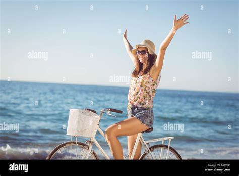 Pretty Brunette Woman On A Bike Ride Stock Photo Alamy