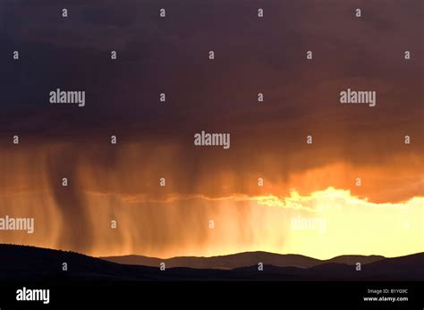 rain  sunset stock photo alamy