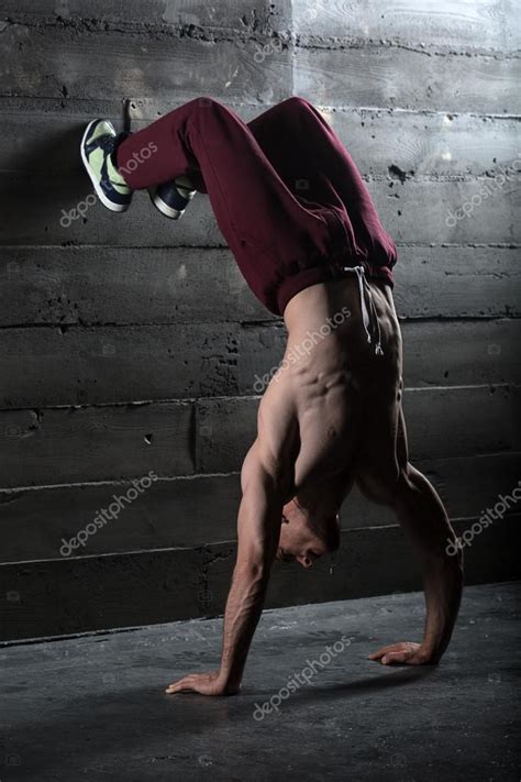 Athlete With Naked Torso Doing Push Ups On His Hands While Stand Stock Photo Bezikus