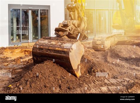 Working Excavator Shovel Moving Soil Stock Photo Alamy