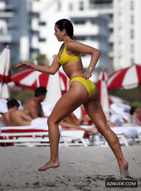 Dua Lipa Sexy In Yellow Bikini As She Takes Dip In The Ocean With Her SisterRina In Miami AZNude