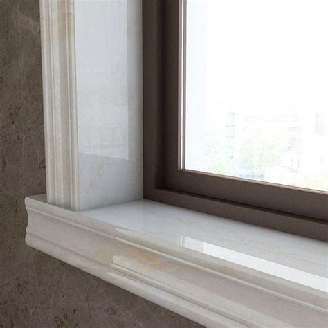 stone facade white marble slab door  window sills marble window