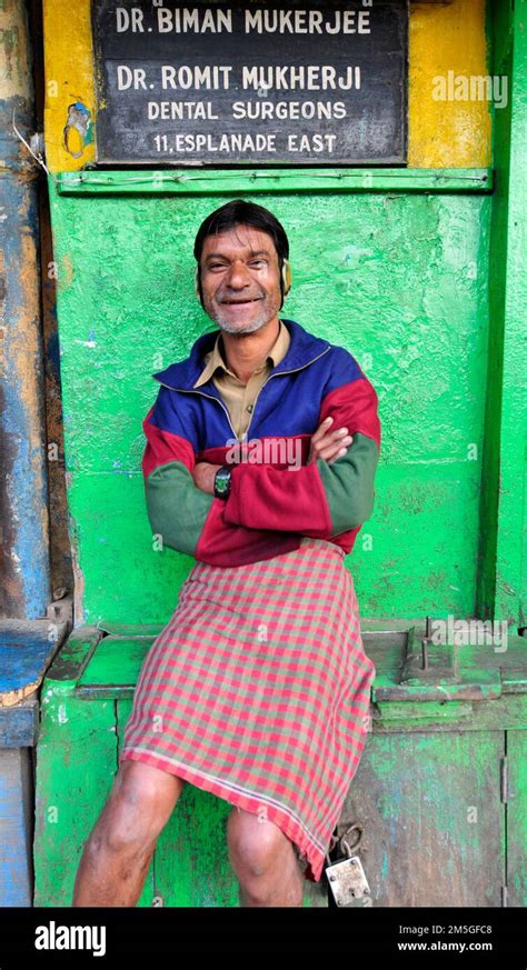 A Smiling Bengali Man Dressed In A Traditional Lungi Kolkata India