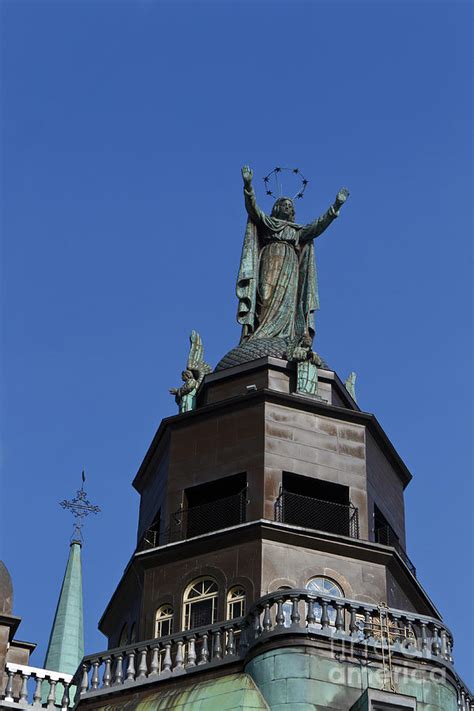 Statue On Top Of The Notre Dame De Bonsecours Chapel And Marguerite
