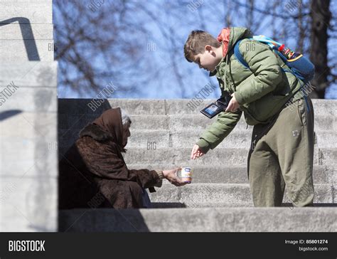 homeless begger giving image photo  trial bigstock