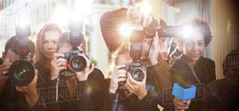 Portrait of paparazzi in a row with cameras and microphone - Stock ...