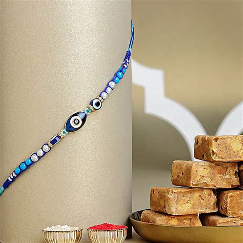 Buy Send Galactic Blue Protector Evil Eye Rakhi With Channa Barfi Combo