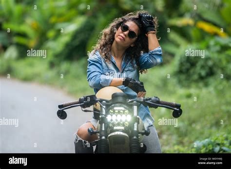 Beautiful Female Biker Driving A Cafe Racer Motorbike Pretty Girl