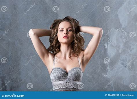 Woman In Gray Sensual Lingerie Posing In Studio Stock Photo Image Of