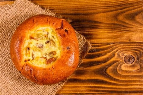 Sweet Bun With Cottage Cheese And Raisins On Wooden Table Top View Stock Image Image Of