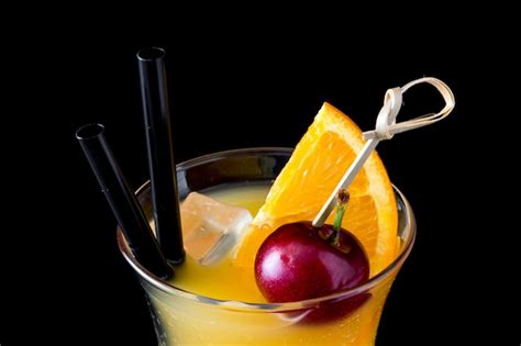 Premium Photo Sex On The Beach Cocktail In Glass On Black Close Up