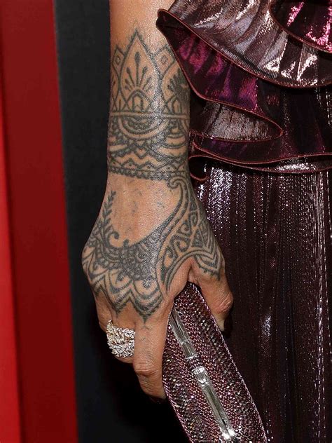 A Guide to Rihanna's Tattoos and What They Mean