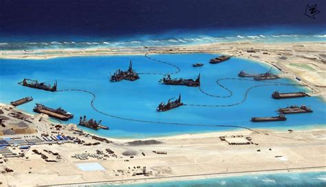 Satellite Images Suggest China Is Arming Strategic South China Sea Base ...