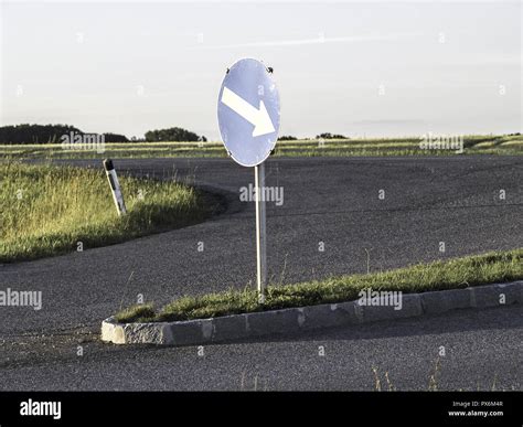 Traffic sign, arrow, keep right Stock Photo - Alamy