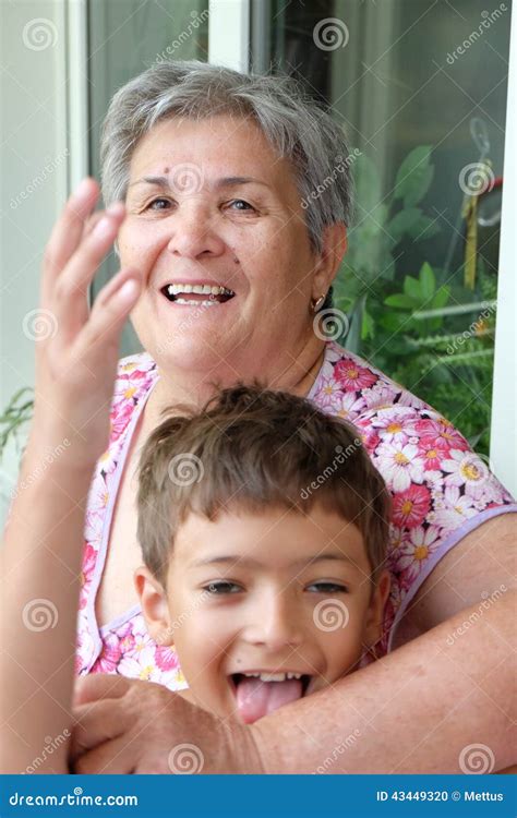 Grandson And His Grandmother Having Fun Together Stock Photo Image Of Happy Mature
