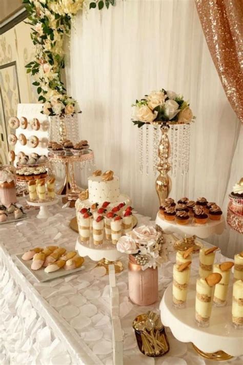 A Table Topped With Lots Of Cakes And Desserts