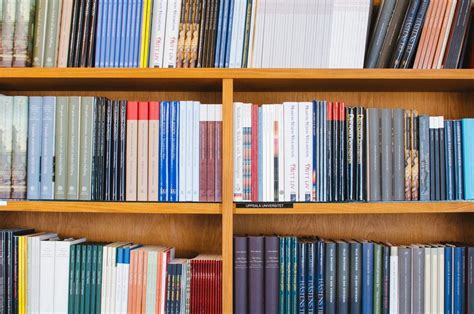 a bookshelf at a library with four shelves at uppsala university ...