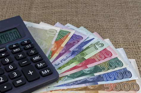 pakistani banknotes  calculator financial planing concept stock