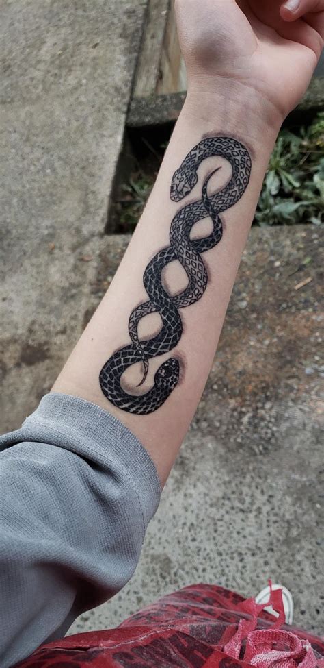 Intertwining Snakes By Geno Creative Souls Everett Snake Tattoo