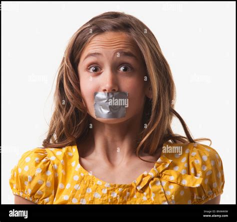 Teenage Girl With Duct Tape On Her Mouth Stock Photo Alamy