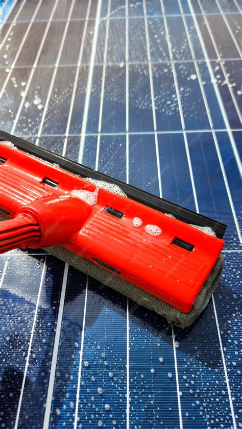 Premium Photo | Cleaning dirty solar panels maintenance