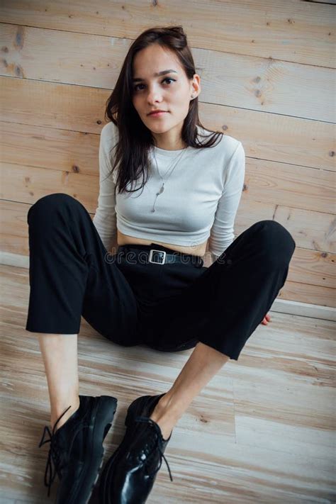 Beautiful Fashionable Slim Brunette Woman Sitting On The Floor Stock Image Image Of Dance