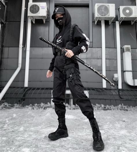 Female Techwear Outfit Has A Black Design And Futuristic Design The