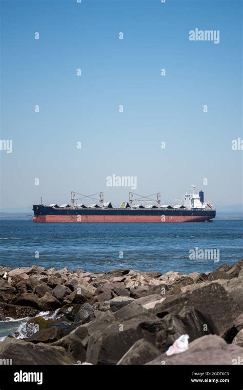 cargo ship    sea   bay stock photo alamy
