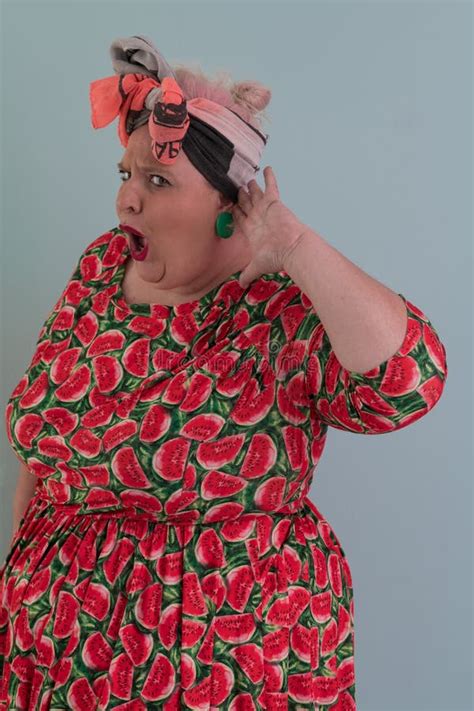 Plus Size Model Woman With Trendy Makeup Fashionable Blonde In Black Short Dress Posing At The