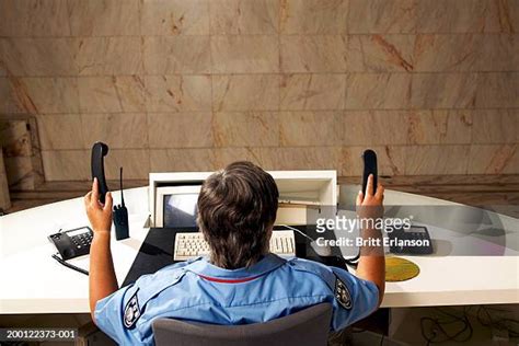 136 Security Guard Desk Stock Photos, High-Res Pictures, and Images ...