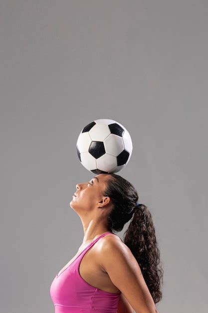 Premium Photo | Soccer woman doing tricks with ball