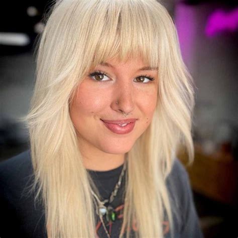 Best Blonde Wolf Cut With Bangs HairAide