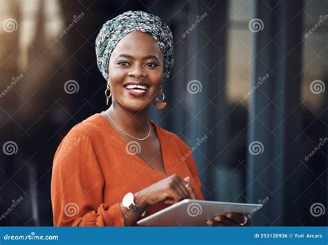 Shes Full Of Bright Ideas An Attractive Businesswoman Using Her Tablet