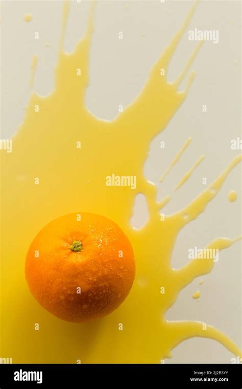 Spilled Orange Juice Creative Photography Stock Photo Alamy