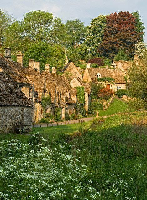 An Old Village With Thatched Roof Houses In The Country Side