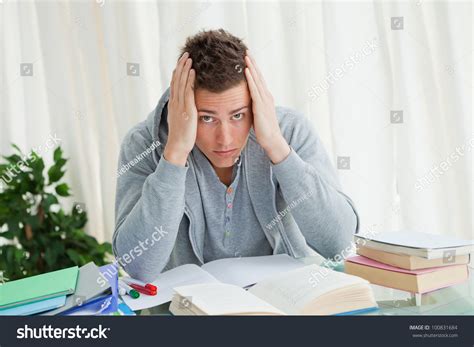 Portrait Distressed Student Doing His Homework Stock Photo 100831684