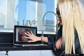 Horny Lucy Zara Puts Cucumber In Her Soft Pussy Photos