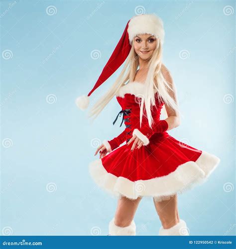 Charming And Attractive Blonde Woman In A Santa Suit Stock Photo Image Of Space Festive